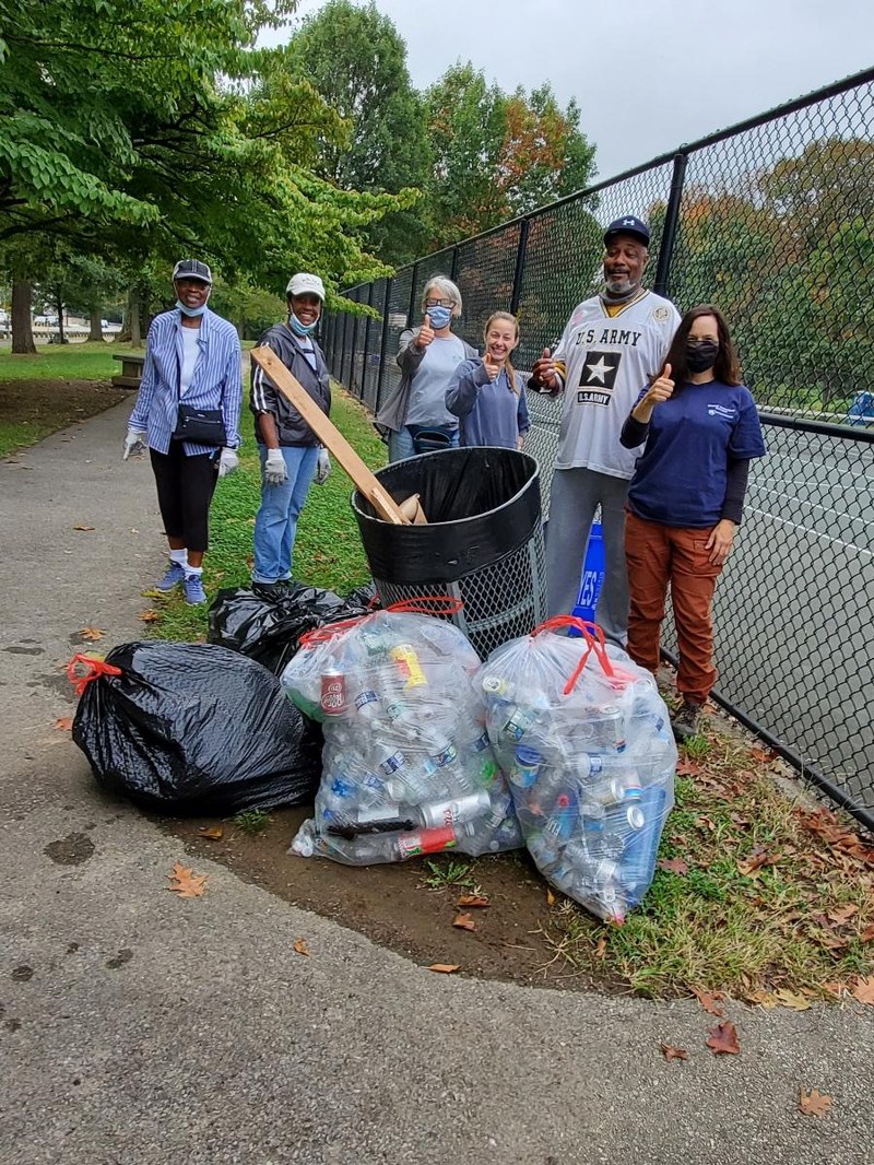 Neighborhood residents volunteer to clean up trash and recycle